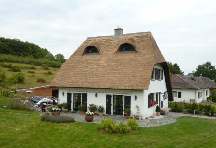 verdrijven en opkloppen rieten dak