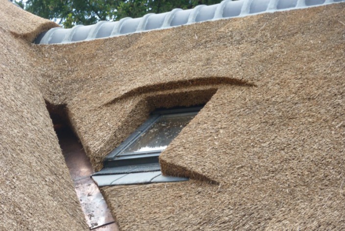 koperen kilgoot rieten dak