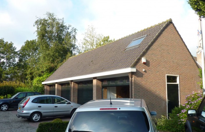 bijgebouw van pannen naar riet